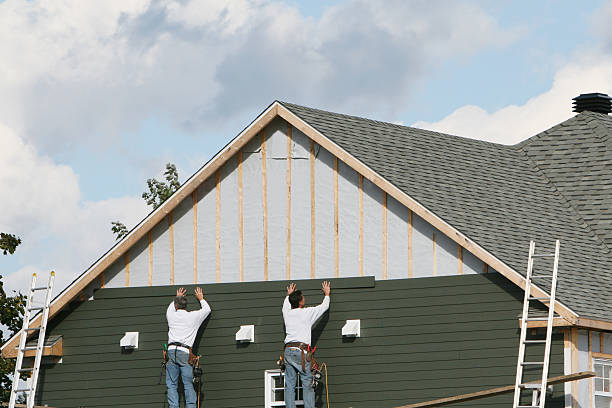 Professional Siding Replacement technician working in La Belle, PA